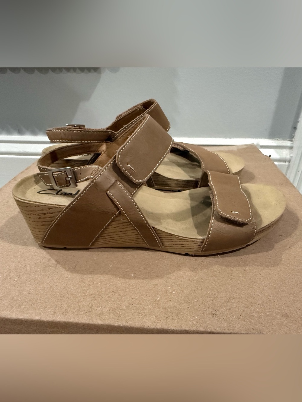 The Clarks Alto Disco Leather Velcro wedge sandal in Beige and Tan